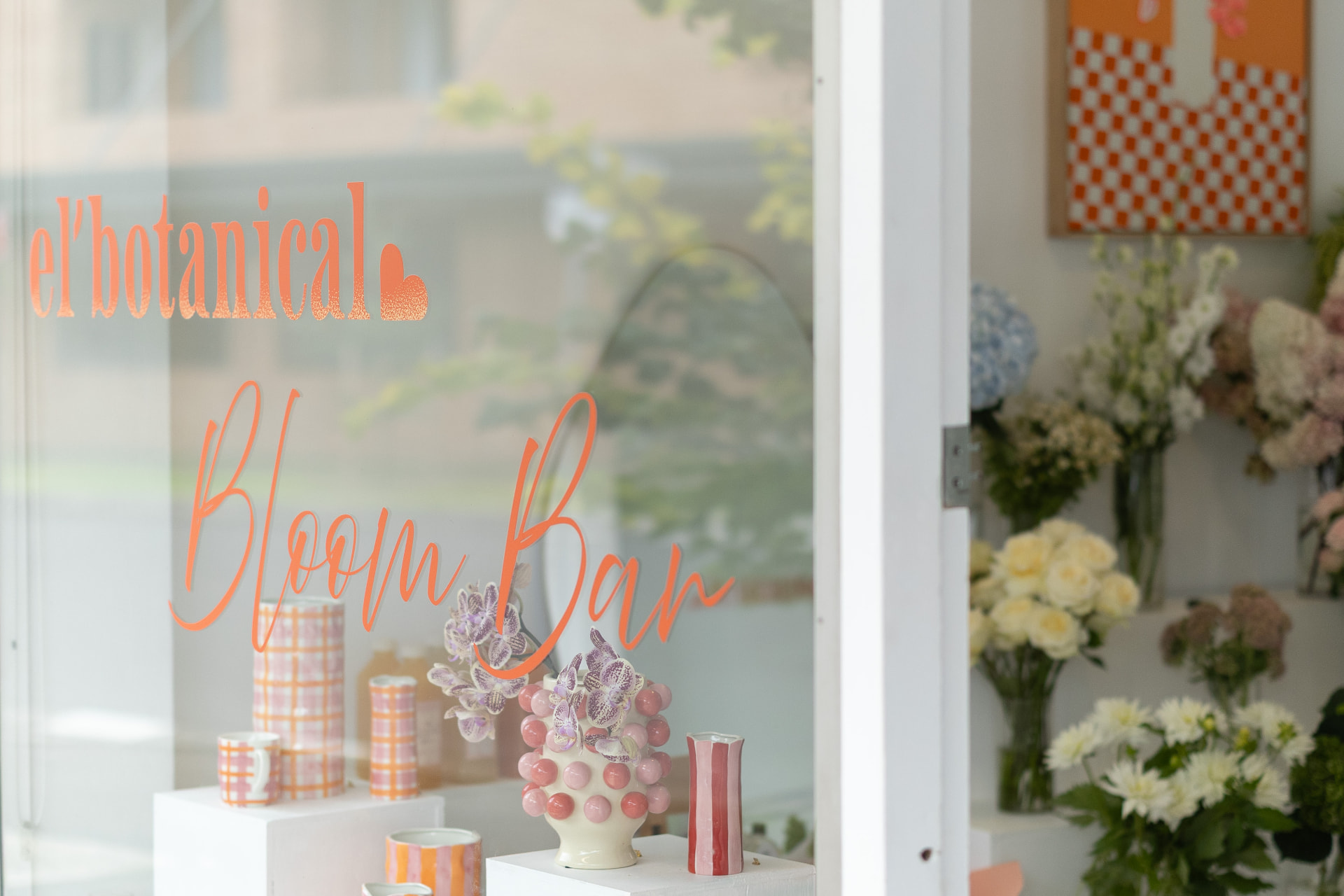 The Bloom Bar shop window in Caringbah filled with flowers
